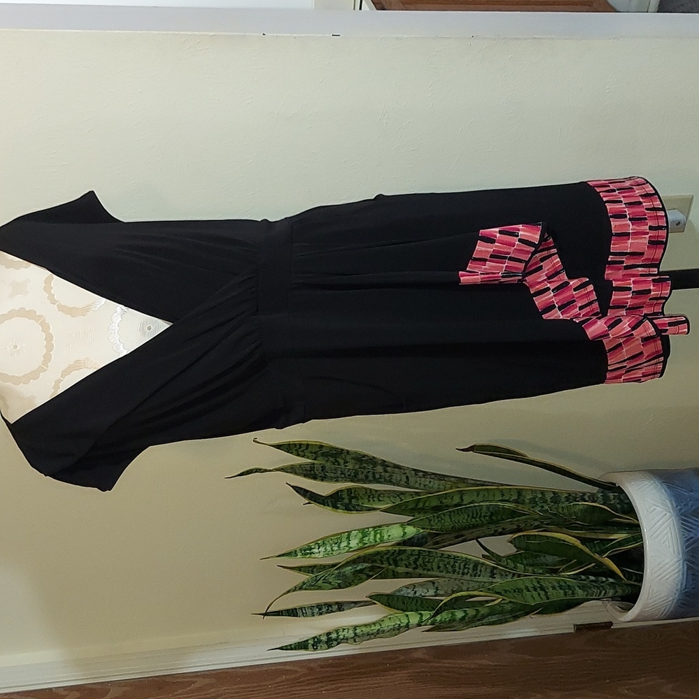 Black cap sleeve dress with pink trim